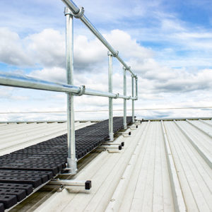 Kee Walk rooftop walkway with guardrail protects workers from fall hazards